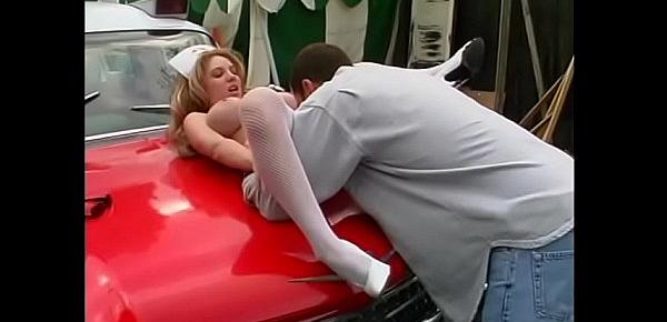  Distracted well-padded blonde nurse Kiki Daire was driving her red Chevrolet Bel Air when she ran over road user on foot
